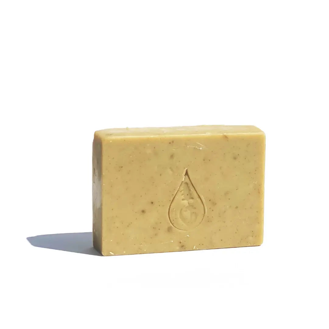 By Valenti Japanese Matcha Green Tea Bar Soap with company's logo stamped on soap on a white background