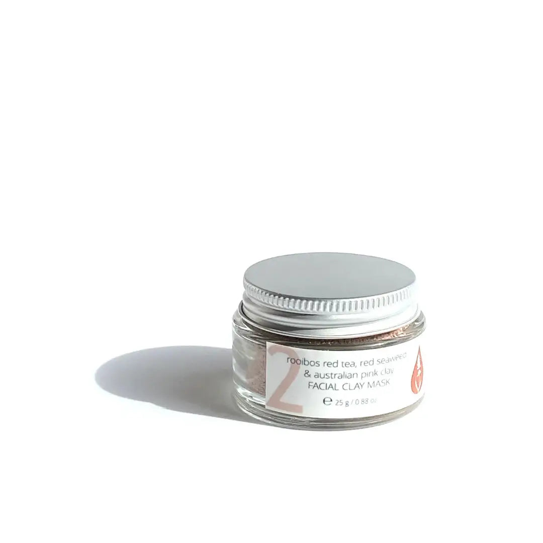 By Valenti facial clay mask jar with a label on a white background